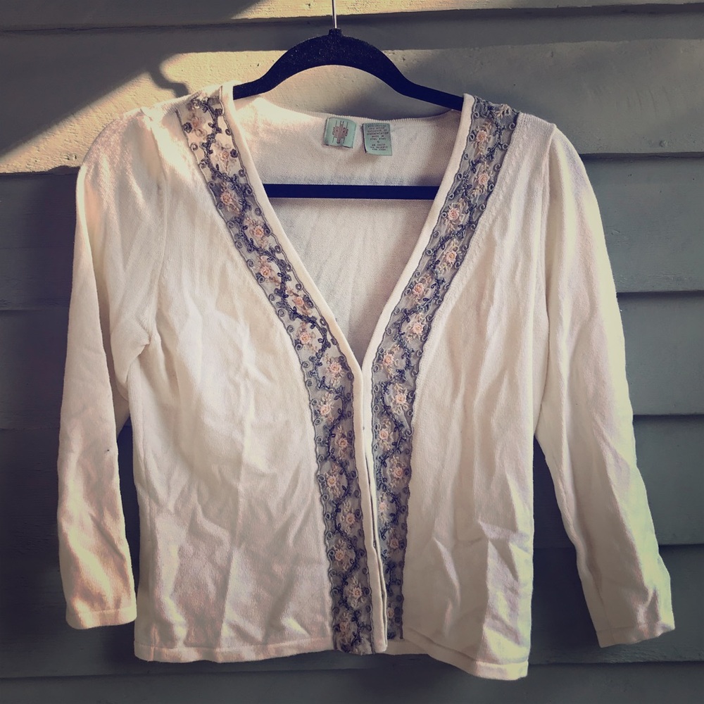 Elegant cream sweater with embroidery